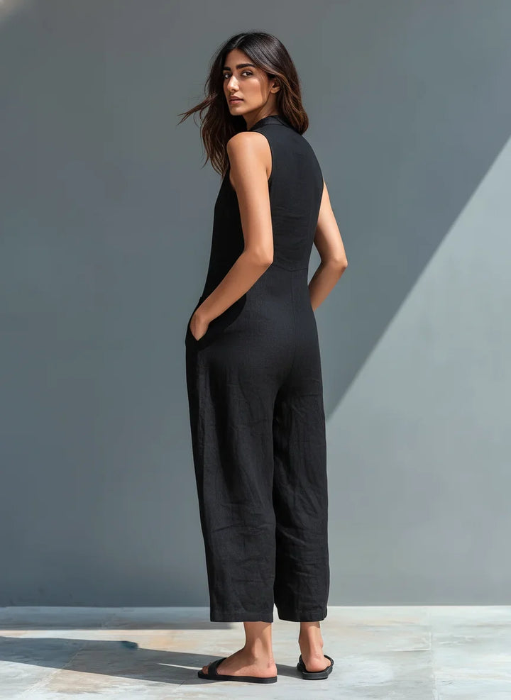 Relaxed fit women's sleeveless wide-leg jumpsuit. Elegant mandarin collar & button front for warm weather style.