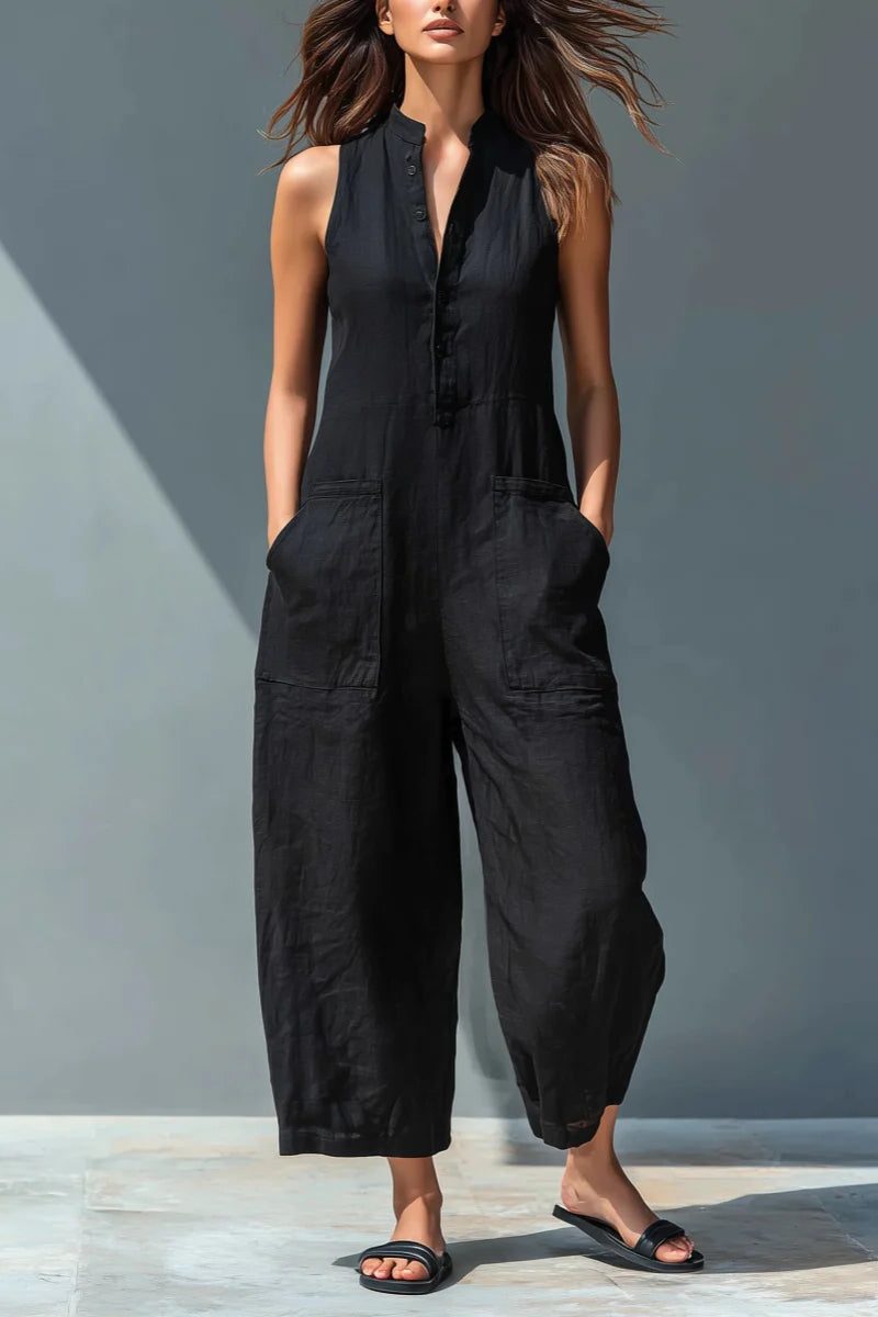 Casual sleeveless wide-leg women's jumpsuit. Features a stand collar & button front for versatile style.