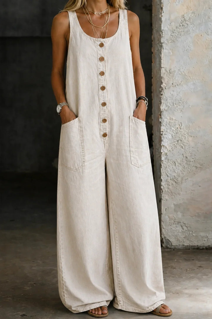 Summer-ready women's overalls, sleeveless with wide legs & practical button front. Relaxed & stylish.