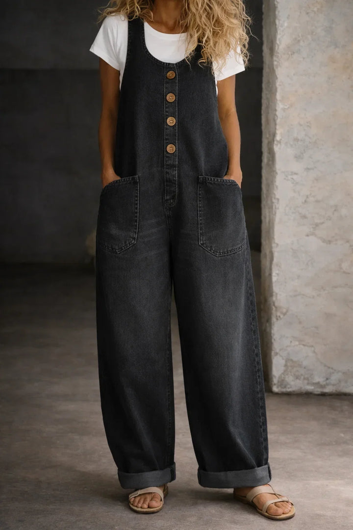 Button front women's wide leg dungarees, sleeveless & comfortable. Ideal for casual summer outfits.