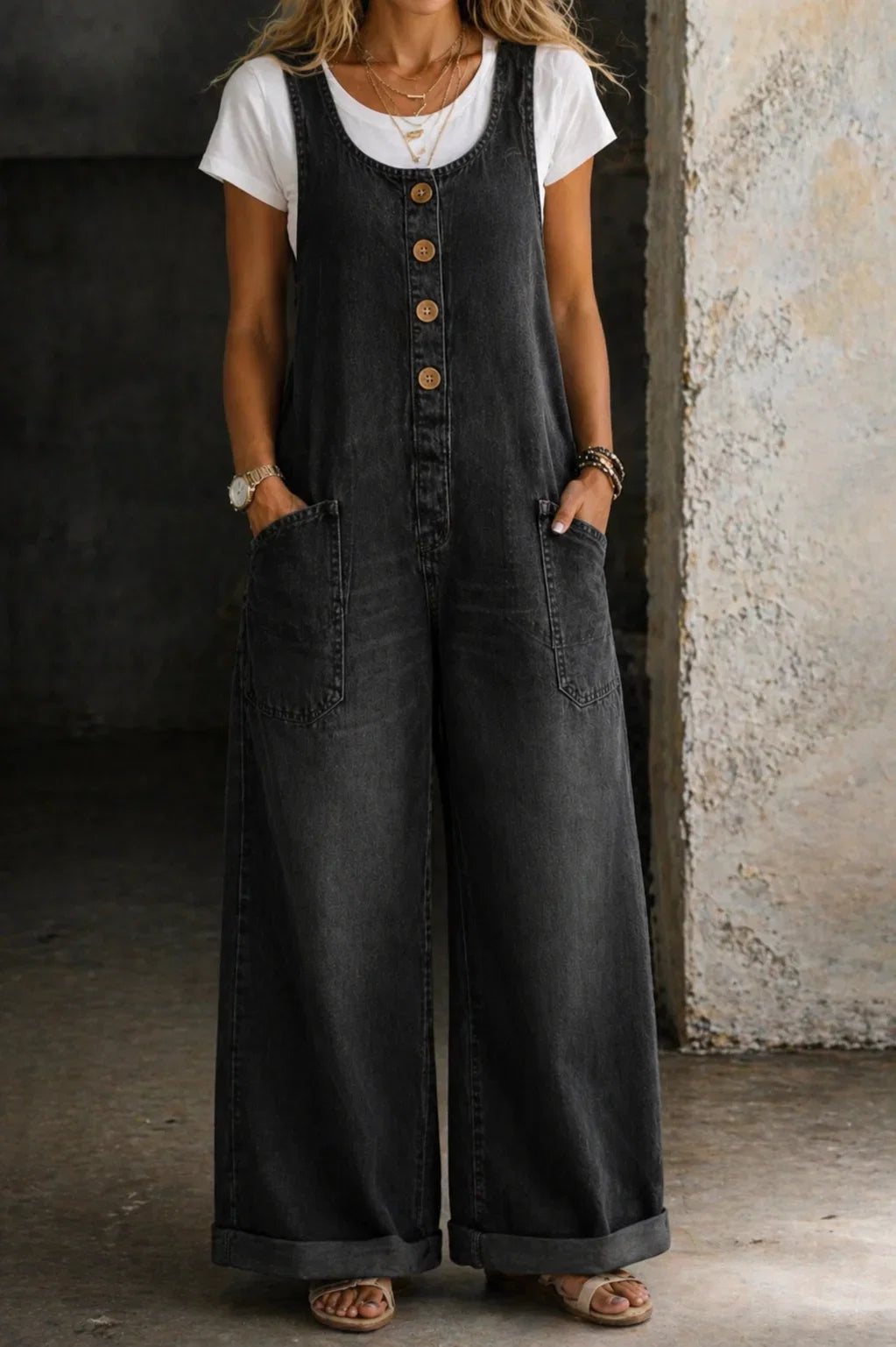 Versatile women's sleeveless wide leg dungarees with a chic button front. Comfortable & fashionable.