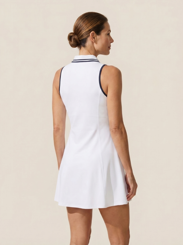 Performance women's sleeveless zip collar dress with built-in shorts. Ideal for tennis, golf & active pursuits.