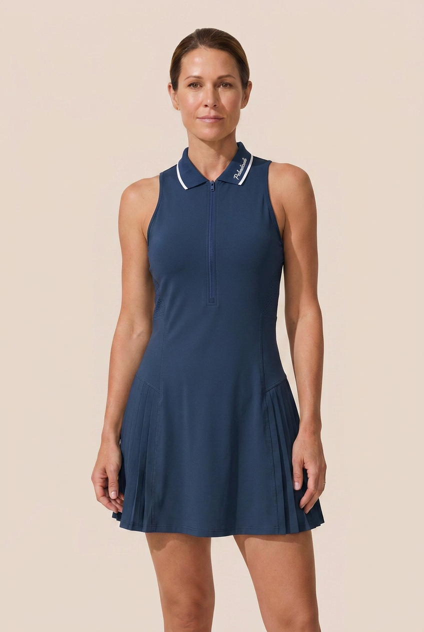 Elegant women's sleeveless zip collar dress. Built-in shorts provide coverage. Ideal for tennis, golf, and active style.