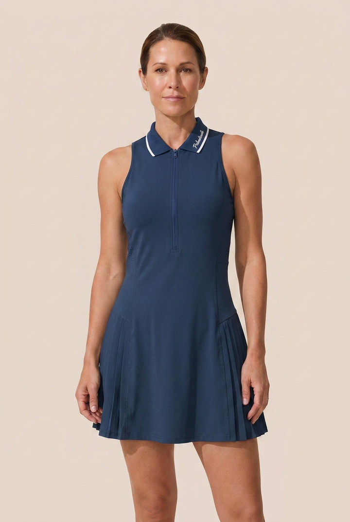 Elegant women's sleeveless zip collar dress. Built-in shorts provide coverage. Ideal for tennis, golf, and active style.