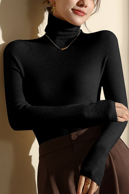 Seamless women's high neck sweater, slim-fit for comfortable warm layering. Ideal for fall & winter.