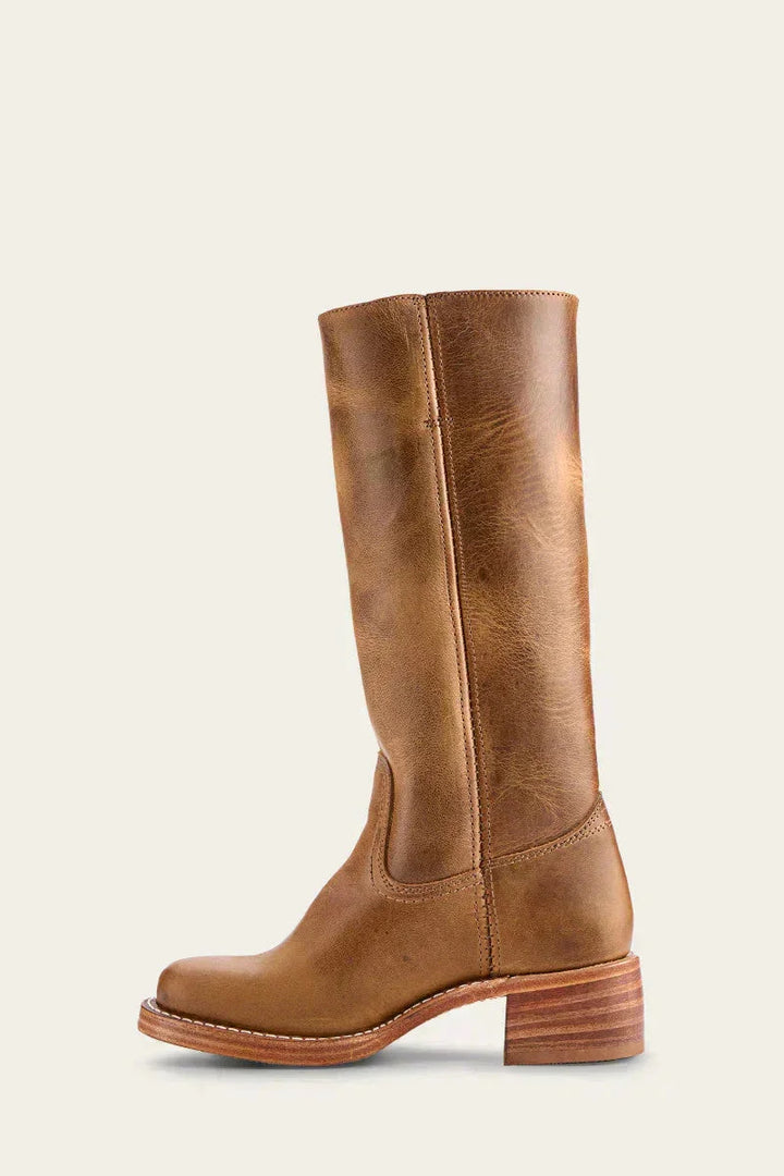 Autumn/winter fashion: Women's slim-fit knee-high boots with supportive structured sole.