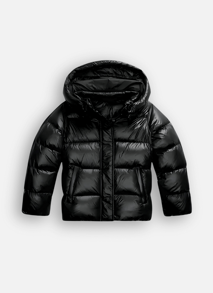 Women's slim-fit puffer jacket for stylish winter warmth. Trendy ladies' outerwear with a modern, glossy finish.