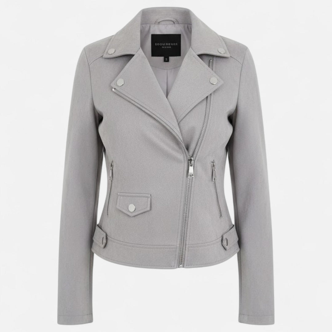 Close-up on the buttons and zipper of a women's chic jacket