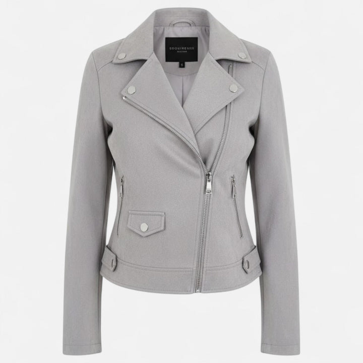 Close-up on the buttons and zipper of a women's chic jacket