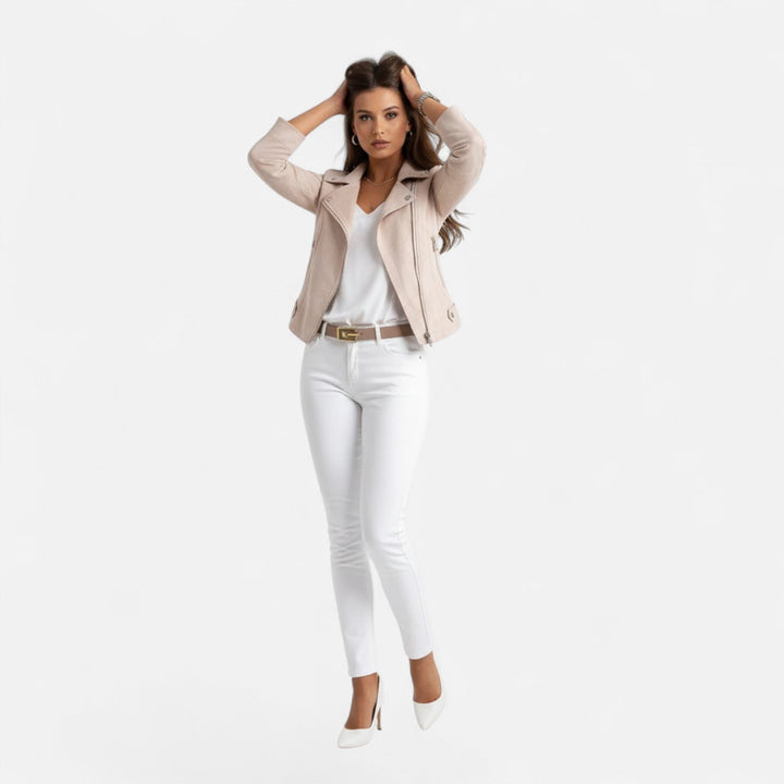 Woman wearing a cropped zip jacket with pockets, stylish layering piece