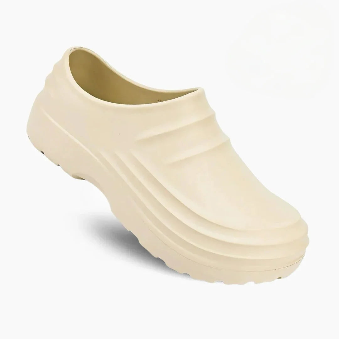 Textured upper on women's comfort slip-on sandals, designed for everyday casual wear and pool visits.