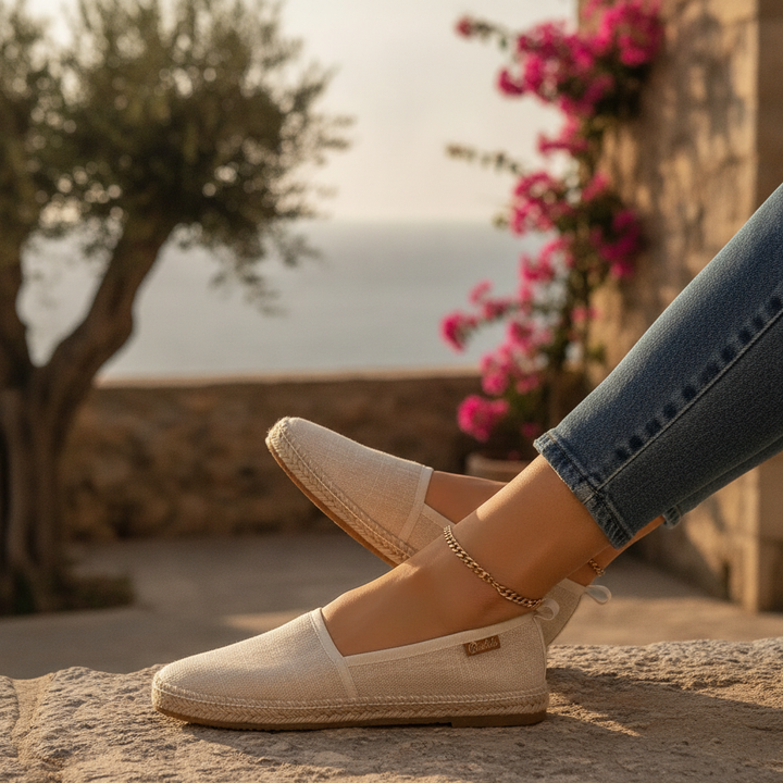 Women's slip-on espadrille flat shoes with rope sole, perfect for effortless summer and holiday style.