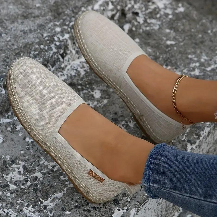 Comfortable women's flat espadrilles, ideal casual slip-on footwear with chic rope sole for summer.