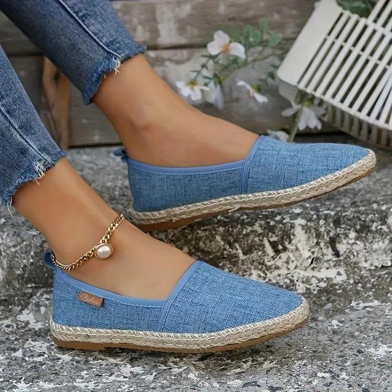 Chic women's espadrille flats featuring a stylish rope sole, perfect for easy summer and holiday wear.