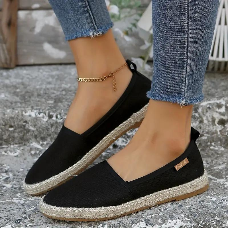 Easy-wear women's espadrille flat shoes with a comfortable rope sole, great for chic summer outfits.