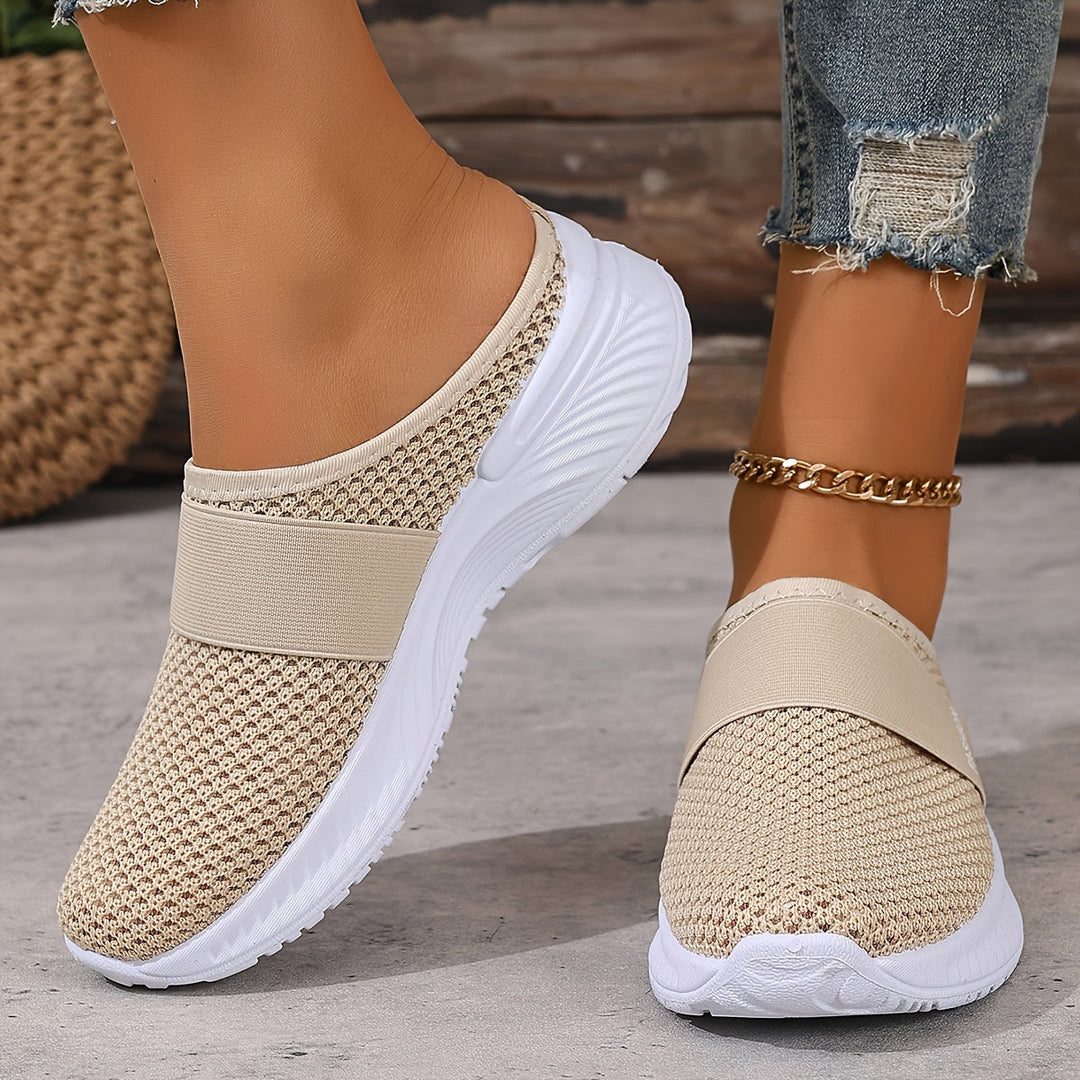 Breathable women's walking sneakers, slip-on design for effortless summer comfort.