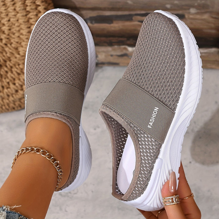Lightweight women's slip-on summer sneakers, perfect for travel and daily comfort.