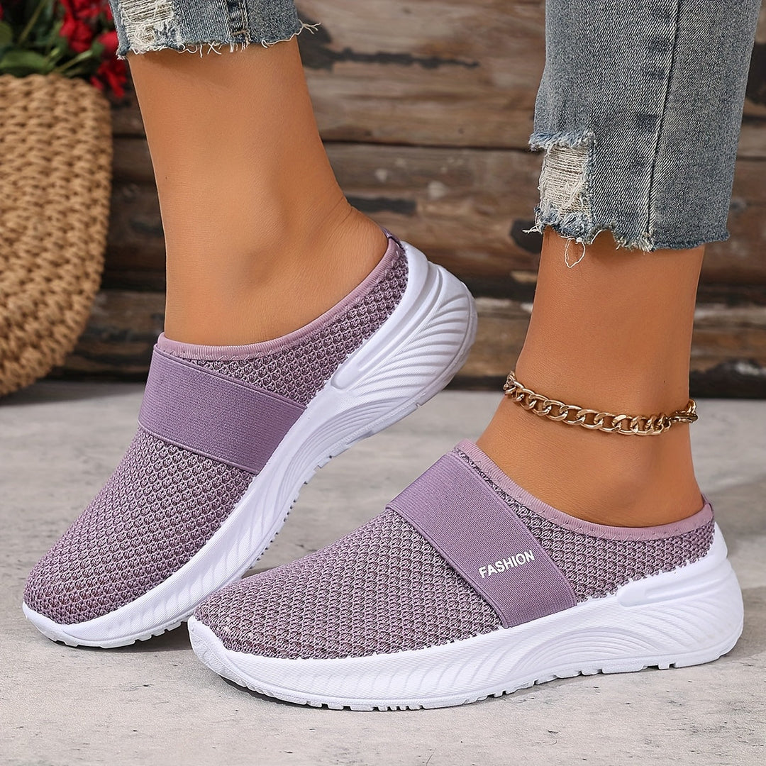 Women's casual slip-on shoes, breathable mesh design for easy summer walking.