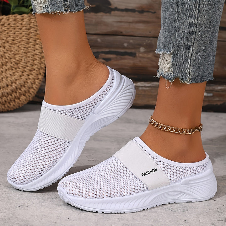 Stylish women's slip-on shoes, lightweight & breathable, perfect for summer comfort.