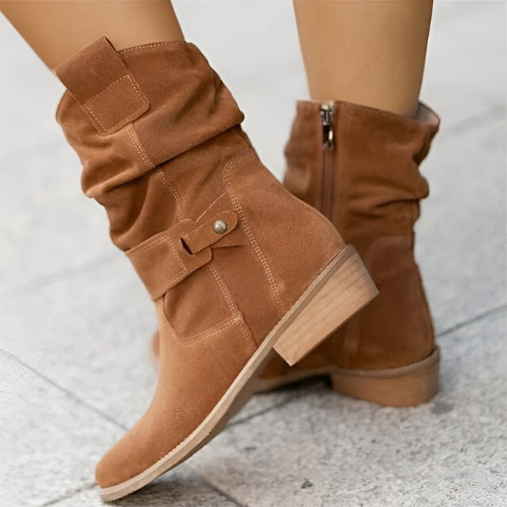 Women's slouchy knee-high boots with comfortable block heel, perfect for autumn casual wear.