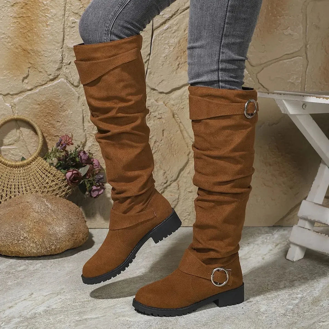 Casual yet elegant women's slouchy knee-high boots, designed with a chic buckle & sturdy lug sole for all-day comfort.