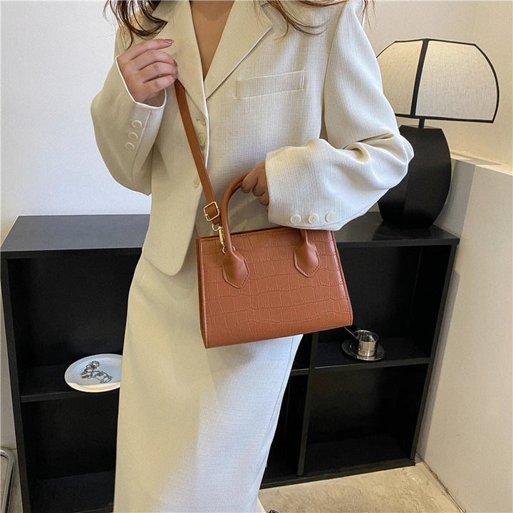 Elegant women's black evening clutch, perfect small handbag accessory for special occasions.