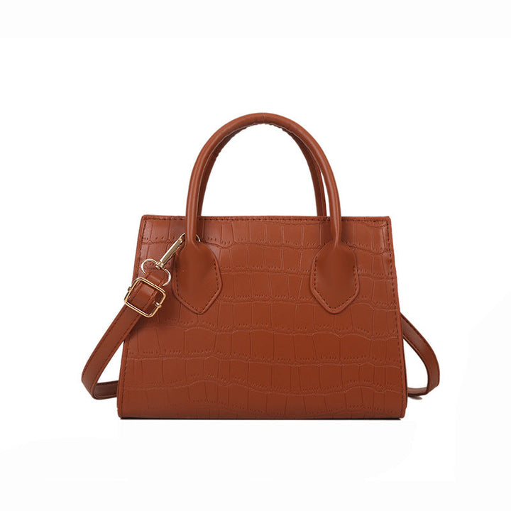 Women's versatile small clutch handbag, perfect black accessory for evening events & daily style.