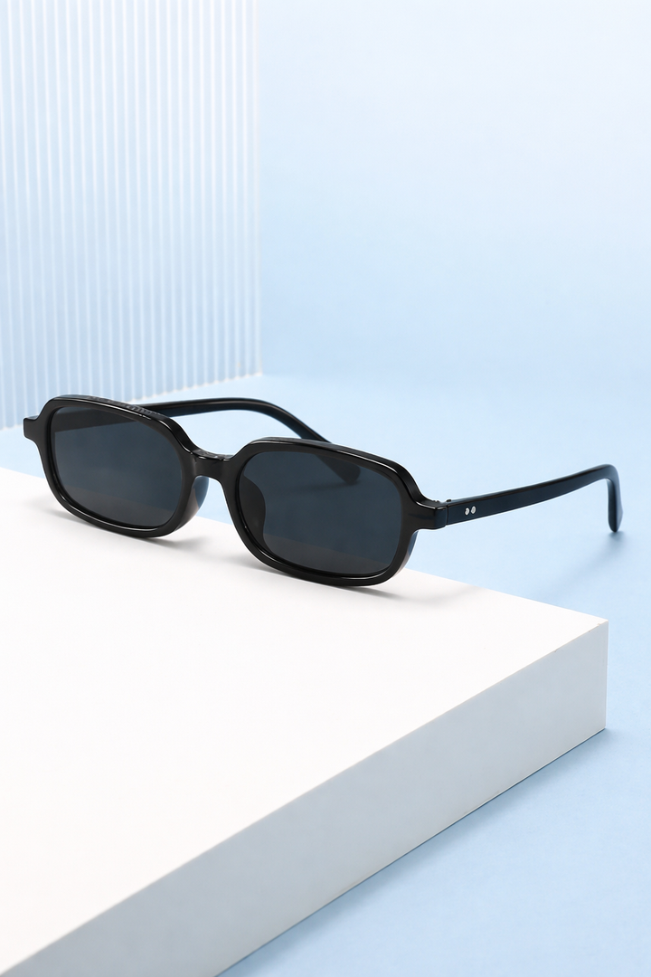 Stylish women's retro small narrow rectangle tinted sunglasses. Fashion eyewear accessory.