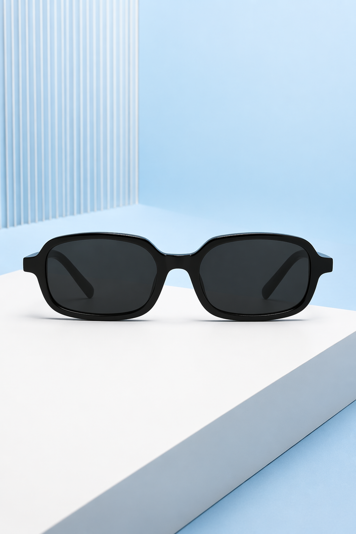 Women's fashion small narrow rectangle tinted retro sunglasses. Chic and minimalist eyewear.