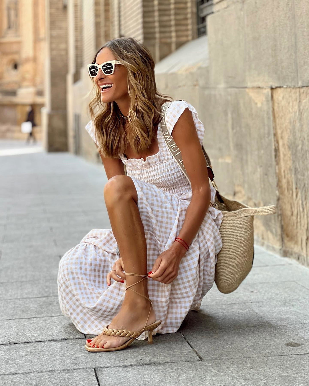 Beige gingham maxi dress for women. Smocked bodice, tiered skirt. Perfect for casual day or vacation.