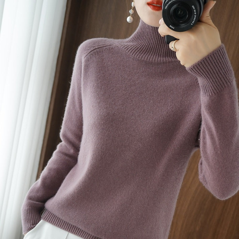 Elegant women's classic turtleneck sweater. A timeless smooth pullover, perfect for chic minimalist fashion.
