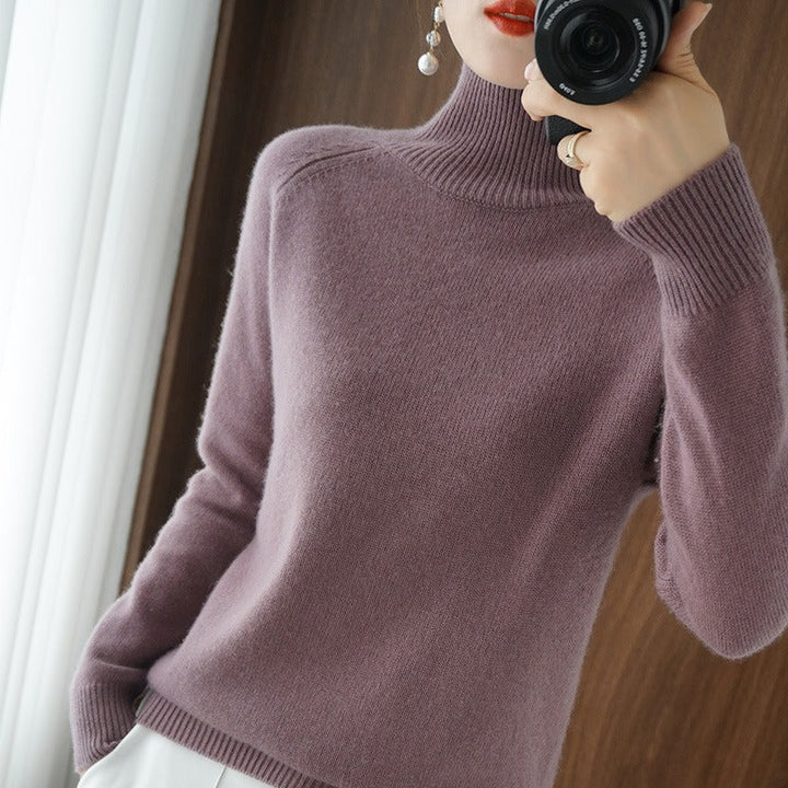 Elegant women's classic turtleneck sweater. A timeless smooth pullover, perfect for chic minimalist fashion.