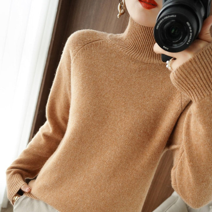 Black women's smooth turtleneck pullover sweater. A comfortable long-sleeve top for everyday elegant style.