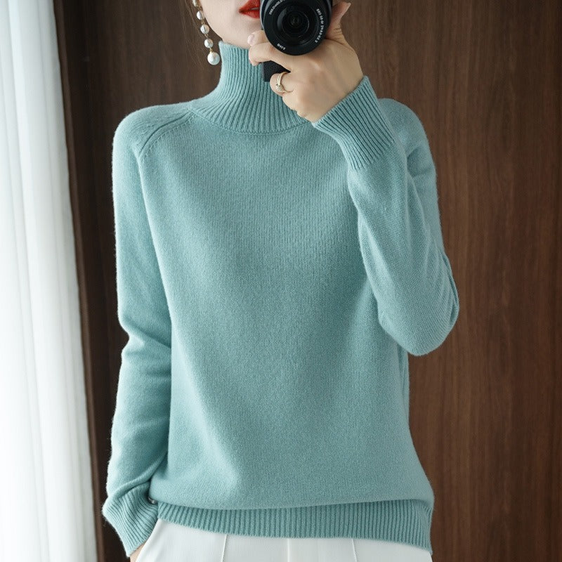 Minimalist women's classic turtleneck sweater. A smooth, versatile long-sleeve pullover for effortless everyday chic.