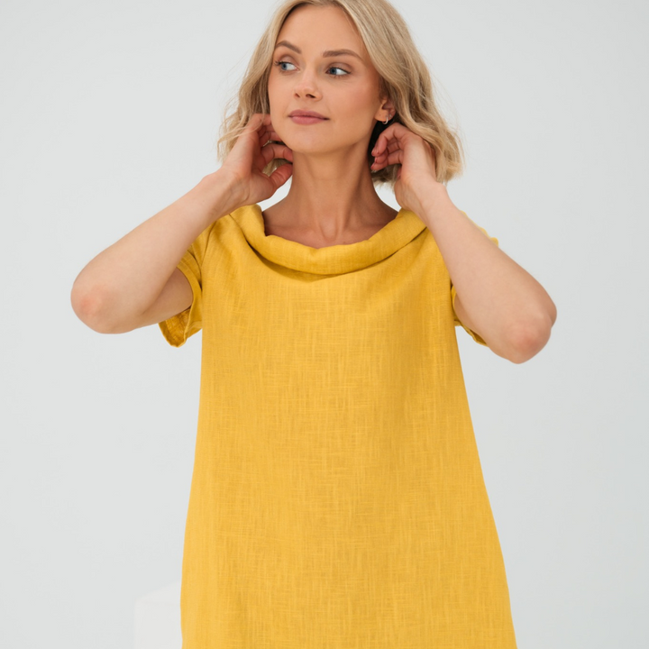 Effortless elegance in a Sofia linen summer dress, short sleeve design.
