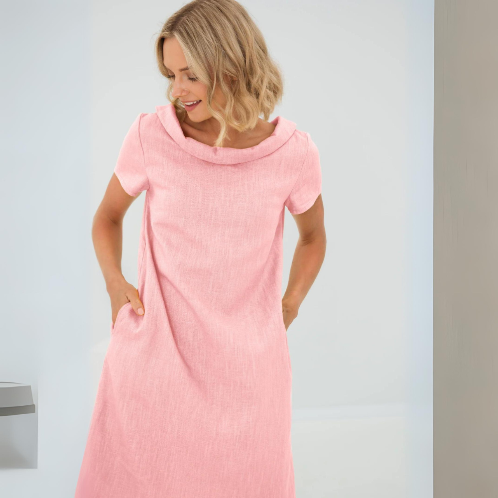 Discover the Sofia linen dress: a breathable, stylish summer midi.