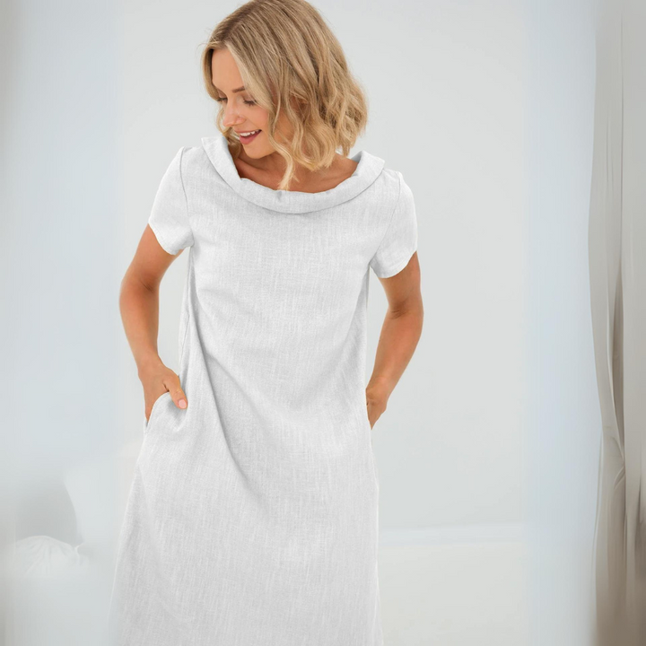 Women's short sleeve Sofia linen dress, ideal for hot summer days.