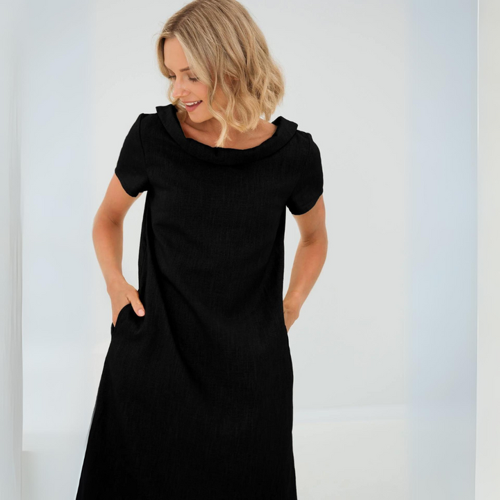 The Sofia linen midi dress offers comfort and style for summer.