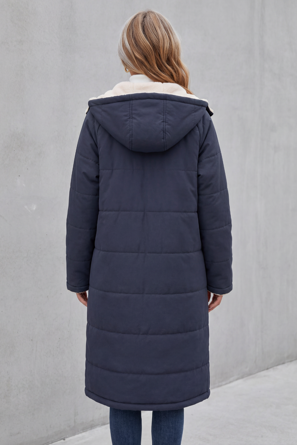Brown women's cozy winter coat. Soft, comfortable, and warm outerwear for casual style.