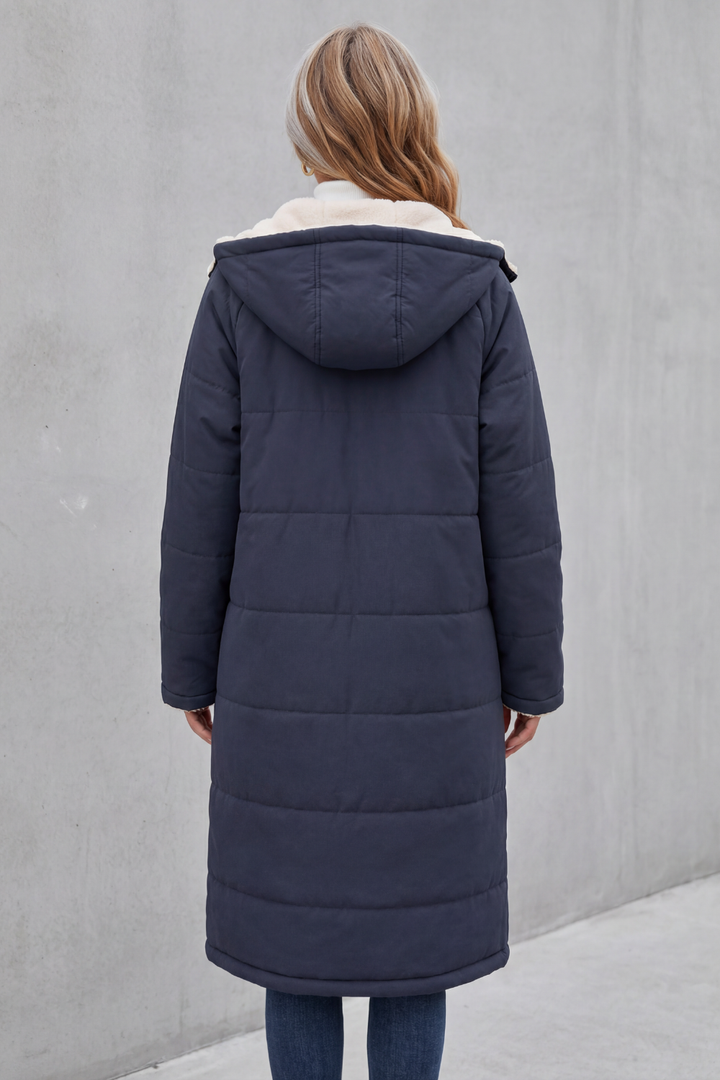 Brown women's cozy winter coat. Soft, comfortable, and warm outerwear for casual style.