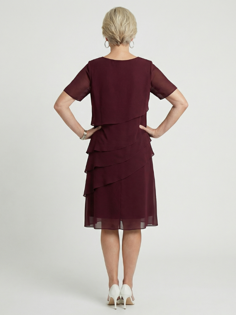 Everyday elegance in a women's knee length contour dress, relaxed fit, short sleeve, versatile comfort.