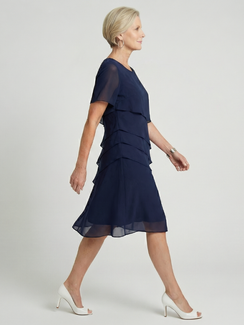 Elegant comfort in a women's soft contour knee length dress, relaxed fit, short sleeve, everyday style.