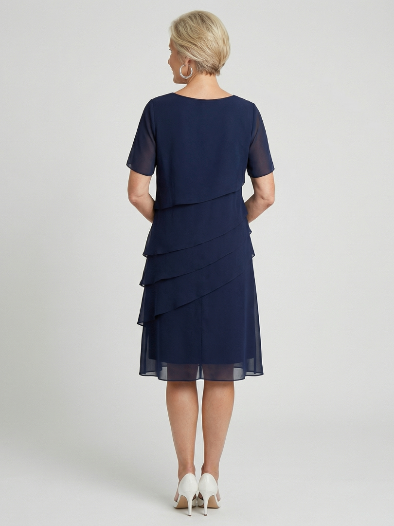 Relaxed fit women's soft contour knee length dress, short sleeve, round neck, offering elegant comfort.