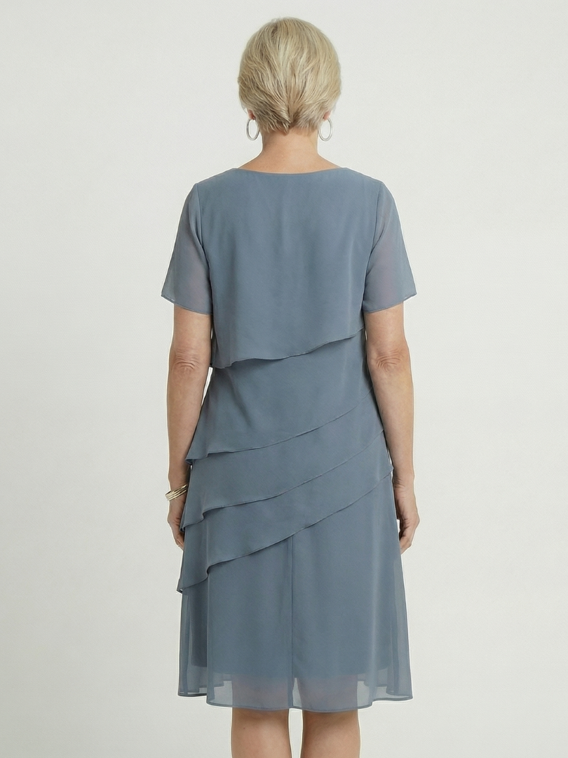 Effortless style with this women's contour knee length dress, relaxed fit, short sleeve & round neck.