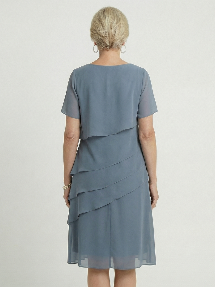 Effortless style with this women's contour knee length dress, relaxed fit, short sleeve & round neck.
