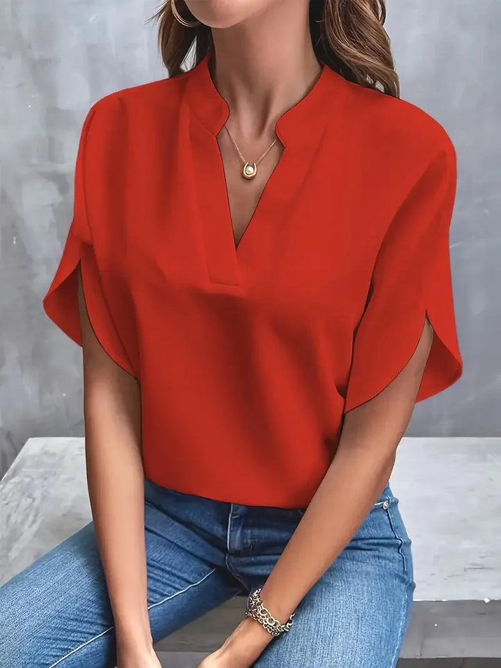 Soft and elegant women's long sleeve V-neck blouse, perfect for a chic and relaxed fit.