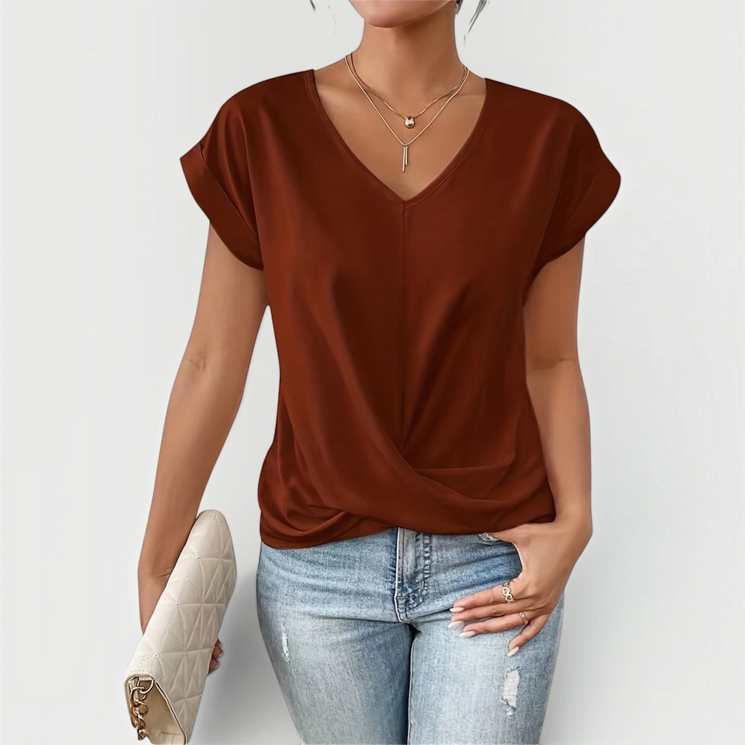 Breathable women's t-shirt with a relaxed fit, offering lightweight comfort for casual summer style.