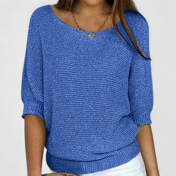 Comfortable women's knit sweater, a chic long-sleeve top for versatile fashion. Ideal for daily wear.