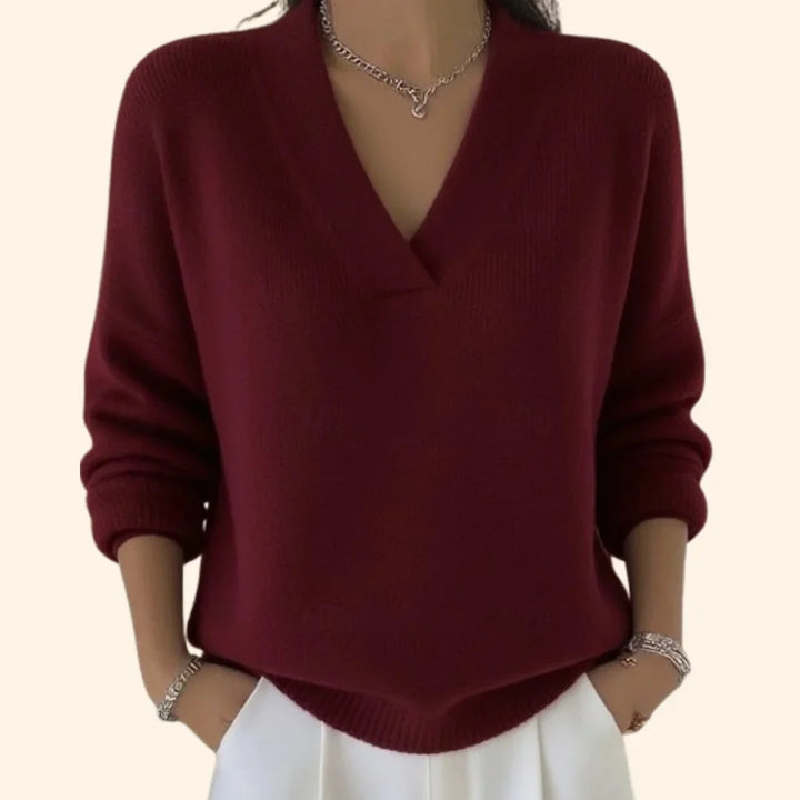 Women's soft knit V-neck long sleeve blouse in a relaxed fit, perfect for comfortable, elegant casual style.