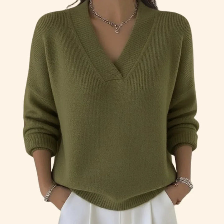Elegant women's V-neck long sleeve knit blouse, ideal for effortless style, casual or dressed up comfort.